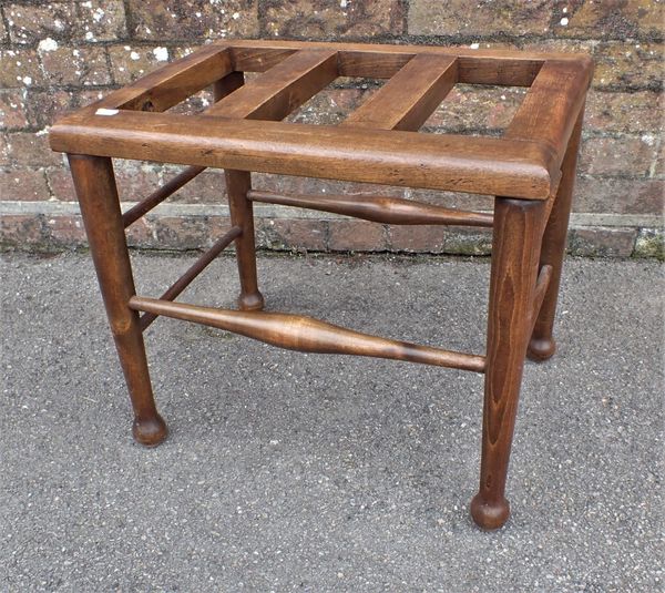 A BEECHWOOD LUGGAGE RACK