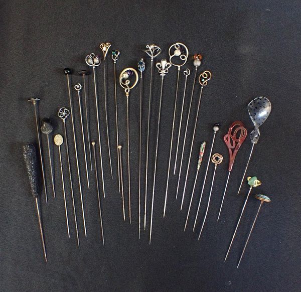 A COLLECTION OF HAT PINS