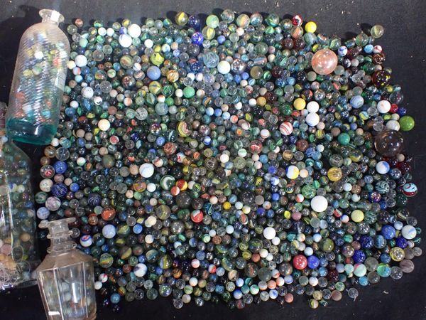 A COLLECTION OF GLASS MARBLES