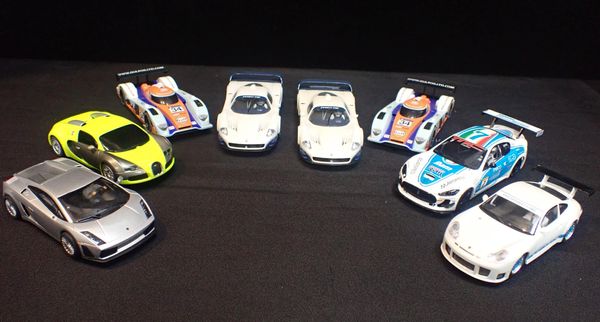 EIGHT UNBOXED SCALEXTRIC CARS