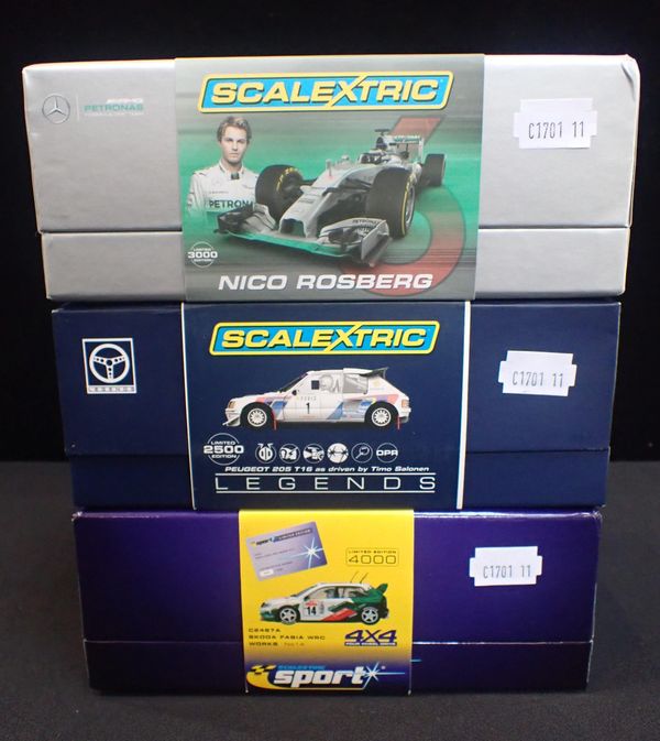 THREE BOXED SCALEXTRIC CARS
