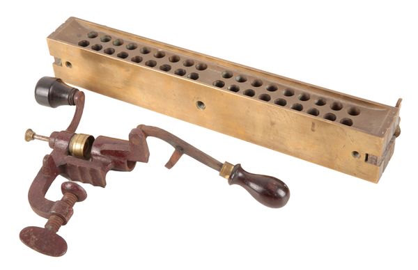 A BRONZE BULLET MOULD