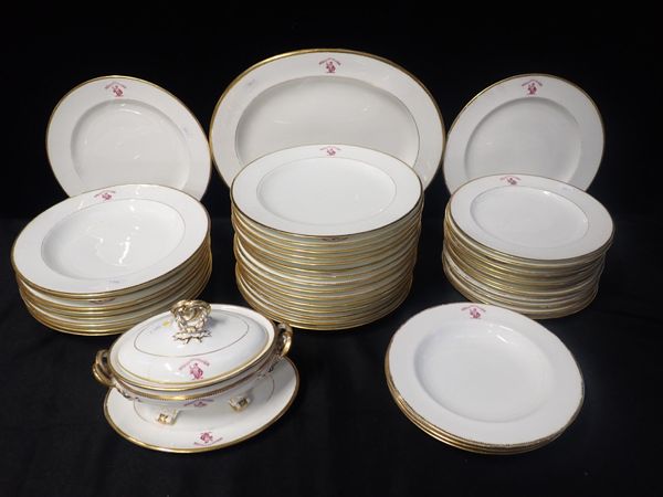 A LATE 19th CENTURY BONE CHINA PART DINNER SERVICE WITH ARMORIAL