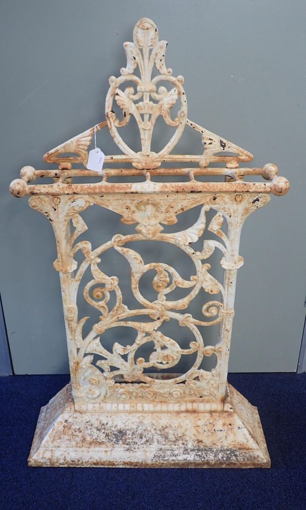 A CAST IRON UMBRELLA STAND, STAMPED A. KENRICK & SONS