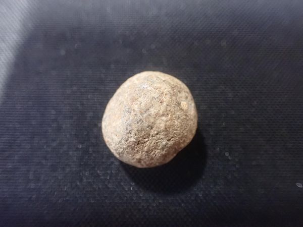 A MUSKET BALL, FROM THE WRECK OF THE 'ASSOCIATION', 1707