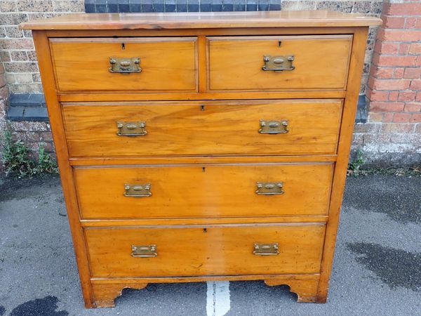 AN EDWARDIAN SATIN BIRCH CHEST OF DRAWERS