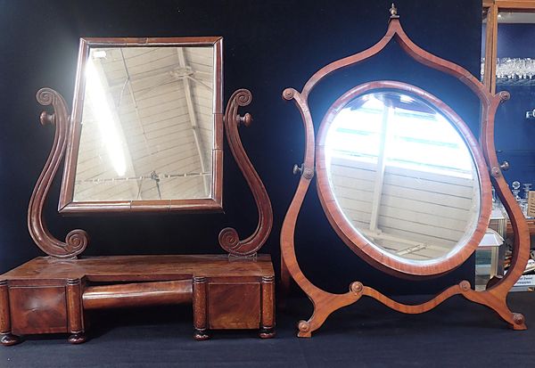 AN EARLY VICTORIAN MAHOGANY DRESSING MIRROR