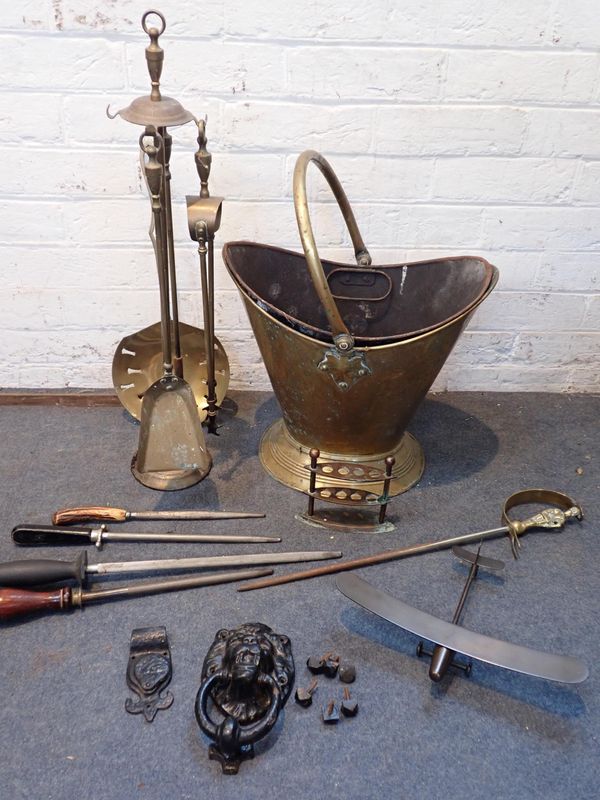A BRASS COAL SCUTTLE