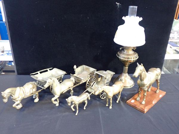 A COLLECTION OF BRASS SHIRE HORSES AND CARTS