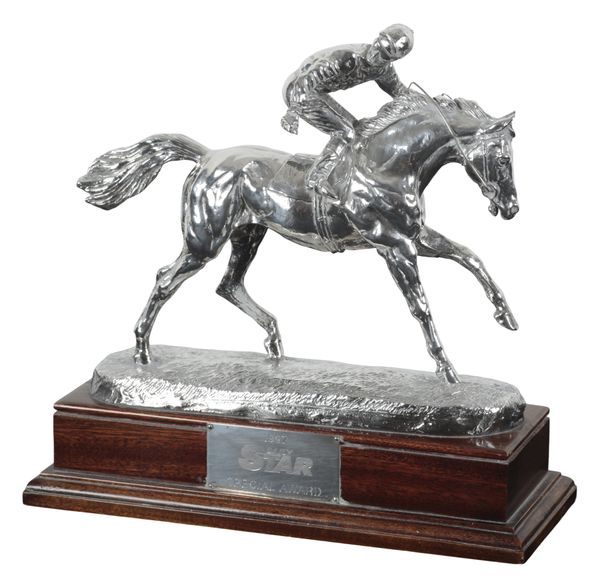 HORSE RACING INTEREST: A FILLED SILVER RACING TROPHY BY D. GEENTY (b.1945)