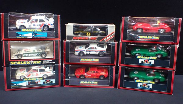 NINE BOXED VINTAGE SCALEXTRIC CARS