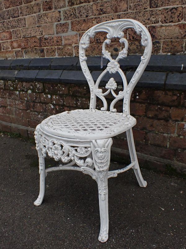 A HEAVY CAST METAL GARDEN CHAIR