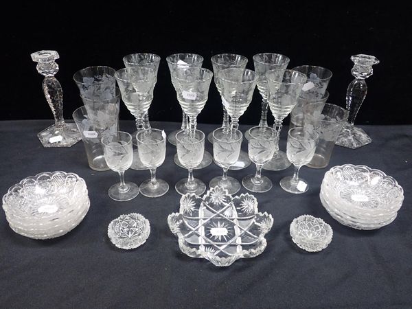 A SET OF WINE GLASSES WITH ENGRAVED DECORATION