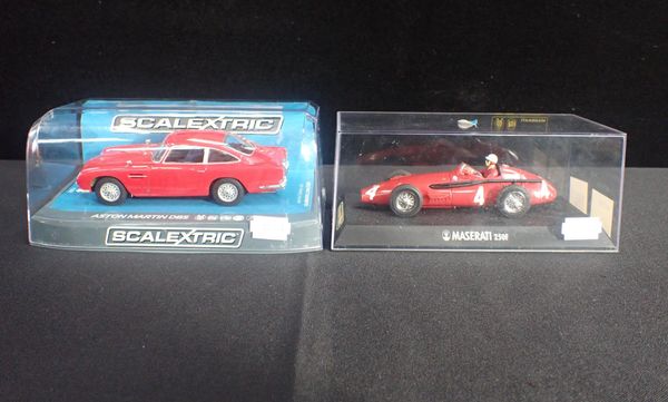 TWO BOXED SCALEXTRIC CARS