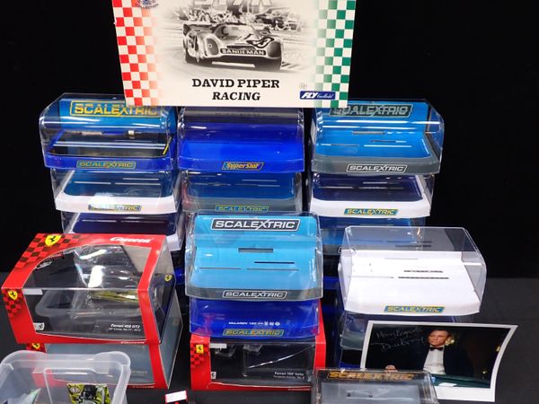 A COLLECTION OF EMPTY SCALEXTRIC CAR DISPLAY CASES