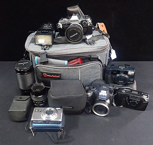 A COLLECTION OF CAMERAS: