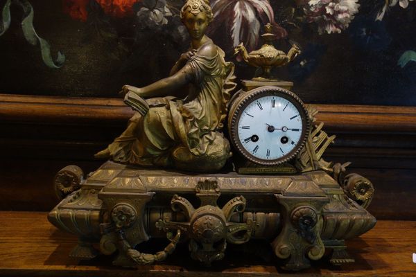 A Louis XVI Style Gilt Metal Mantel Clock