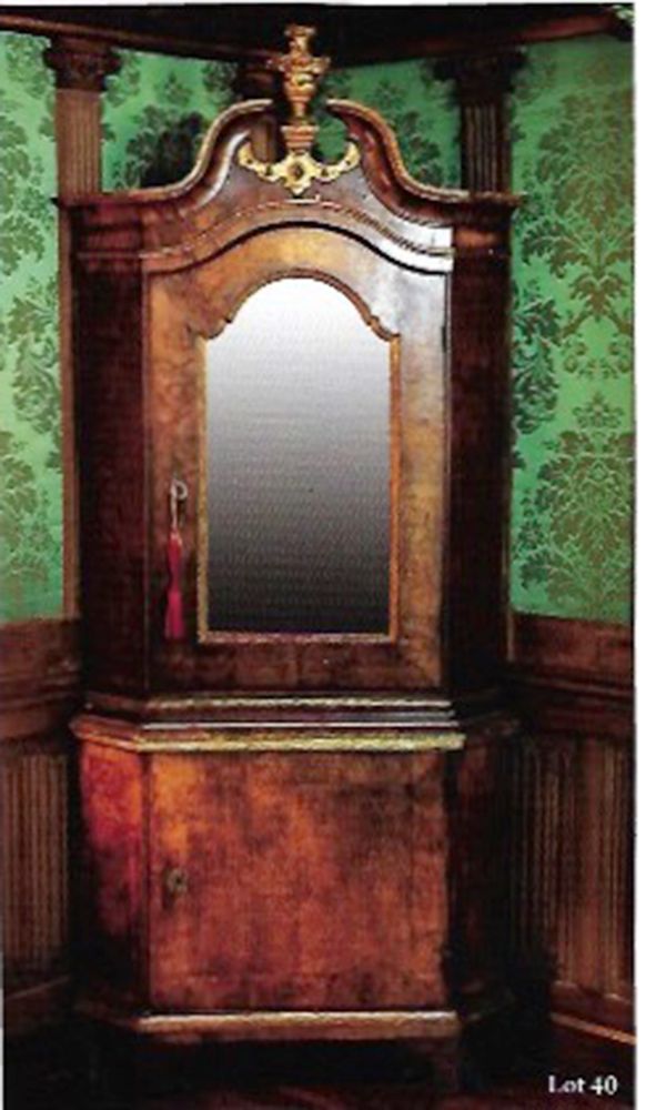 A Danish Walnut Veneered and Parcel-Gilt Standing Corner Cupboard
