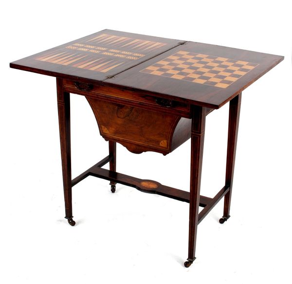 An Edwardian rosewood & inlaid combined games and work table
