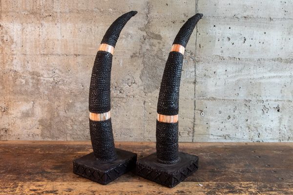 BRAIDED LEATHER AND BONE HORN SCULPTURE PAIR