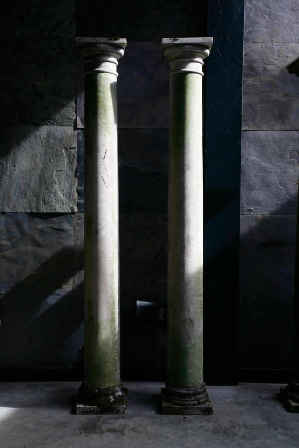 † A set of eight sandstone columns (daggered lot)