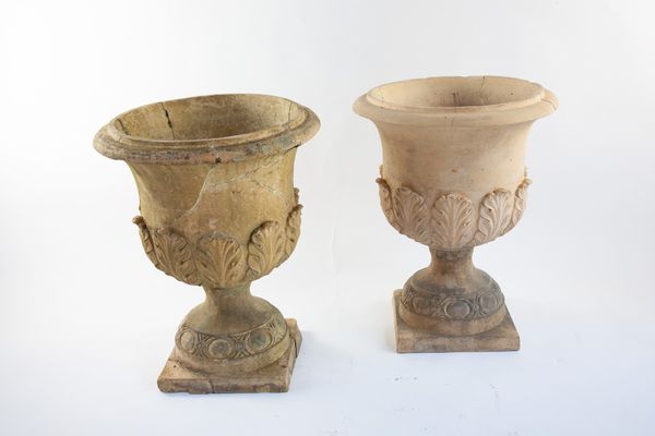 A pair of Doulton stoneware urns