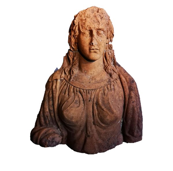 An unusual terracotta bust of a woman 18th century or earlier 70cm high