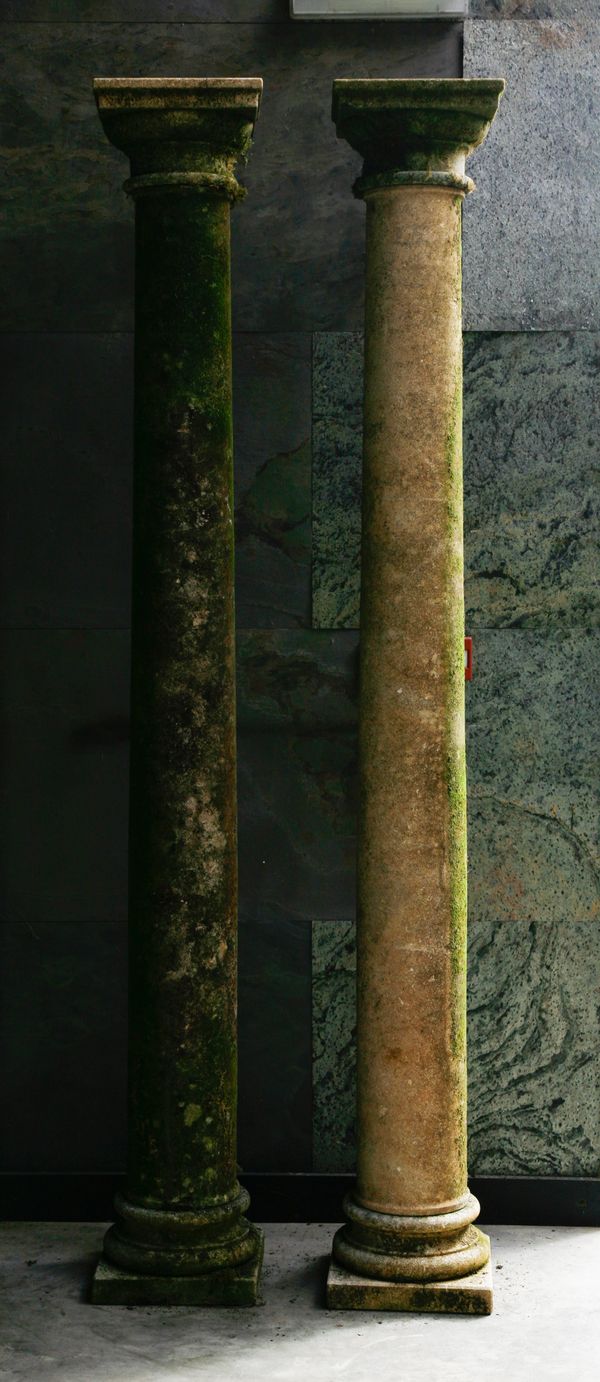† A set of four Vincenza stone columns (daggered lot)