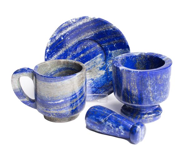 A lapis lazuli cup and saucer and mortar and pestle