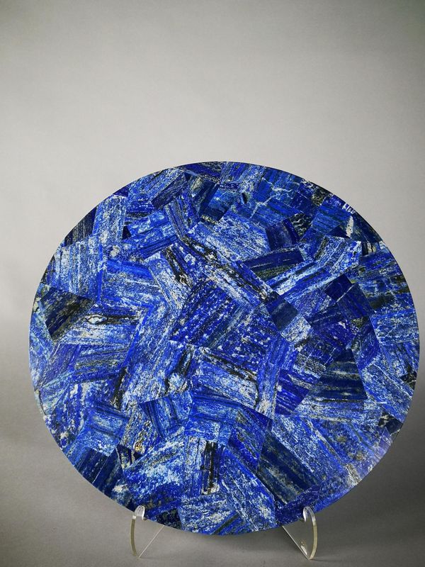 A Lapis lazuli veneered circular tabletop 52cm diameter