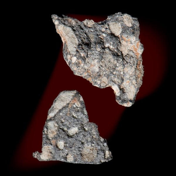 Two Lunar meteorites the larger 30mm 2.8gr