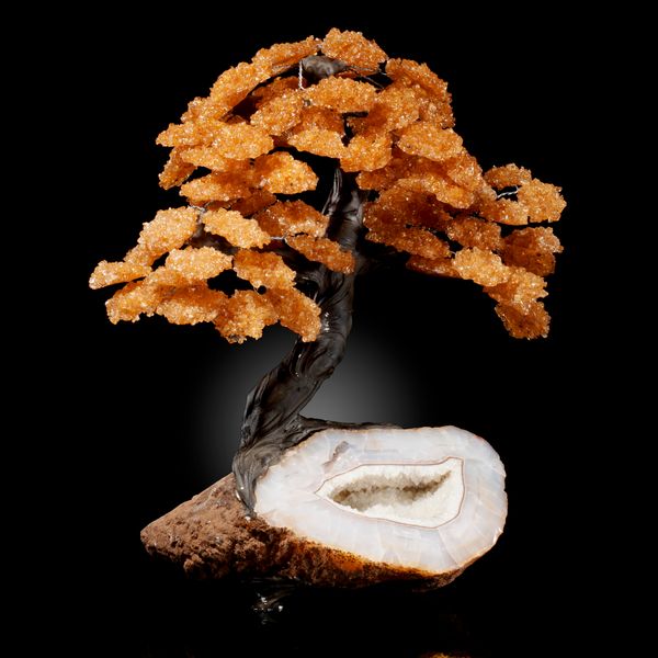 A large citrine tree on natural geode base 40cm high by 25cm wide