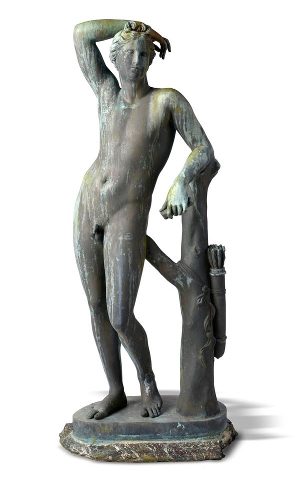 After the Antique:  A bronze figure of the Medici Apollo  last quarter 19th century on fragmentary marble base 152cm high  Provenance: The Countess...