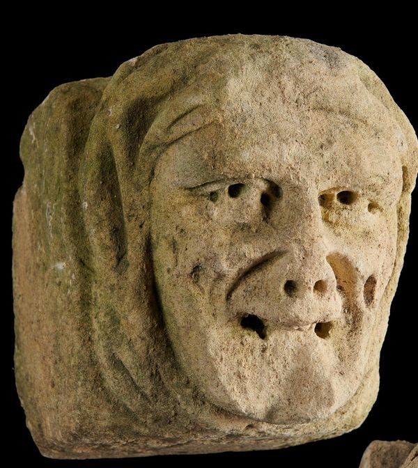 A similar medieval carved limestone architectural head English or French, 15th century  24cm high by 25cm wide