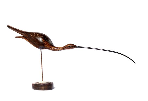 &#9650; Guy Taplin (b.1939) Running Curlew Painted and gessoed driftwood Signed and dated 1997 99cm wide