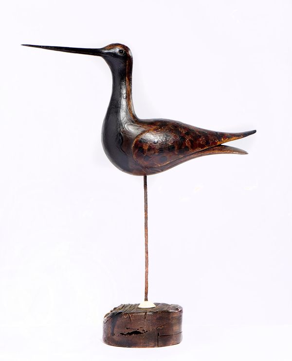 &#9650; Guy Taplin (b.1939) Golden Plover Painted driftwood Signed and dated 1998 51cm wide
