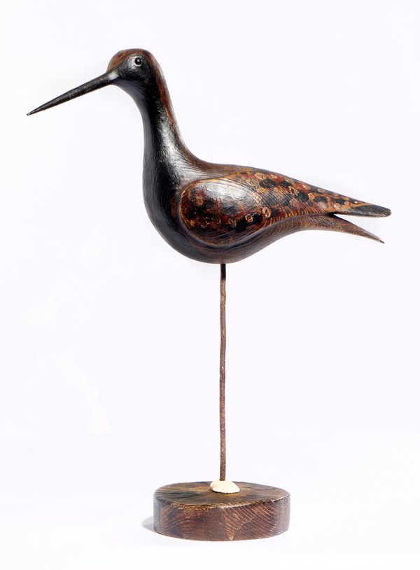 &#9650; Guy Taplin (b.1939) Small Golden Plover Painted driftwood Signed and dated 1998 40cm wide