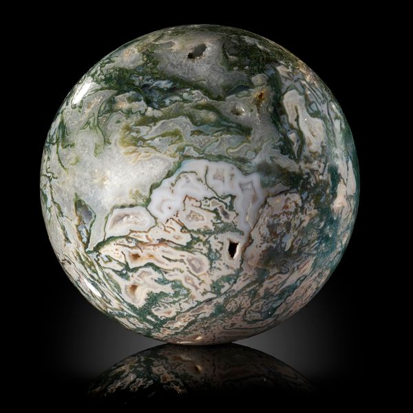 A large moss agate sphere India 21cm diameter 
