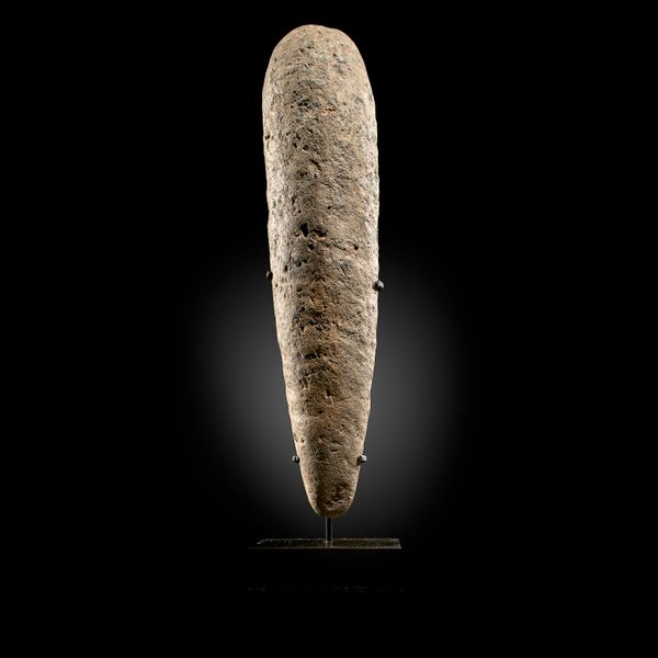 A prehistoric menhir type tool Sahara, Neolithic on bronze stand 40cm  
