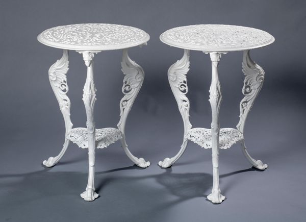 A pair of rare Coalbrookdale cast iron occasional tables last quarter 19th century with diamond registration stamp 53cm diameter This table is...
