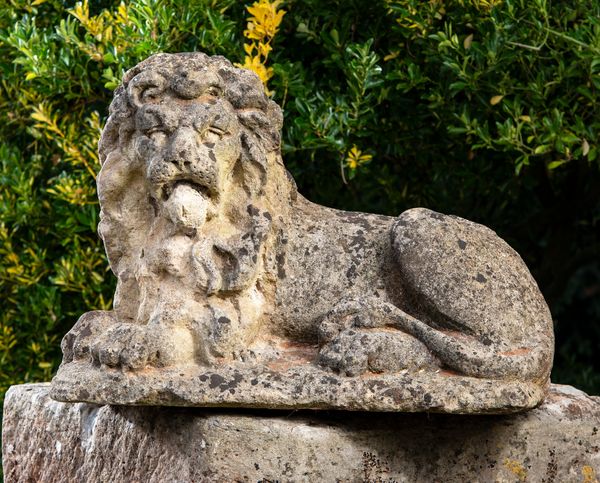 An early Victorian carved stone lion the back dated 1837 66cm high by 95cm long Possibly carved to celebrate the coronation of Queen Victoria in...