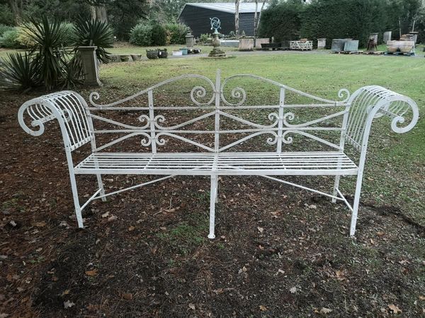 A Regency reeded wrought iron seat early 19th century 240cm wide