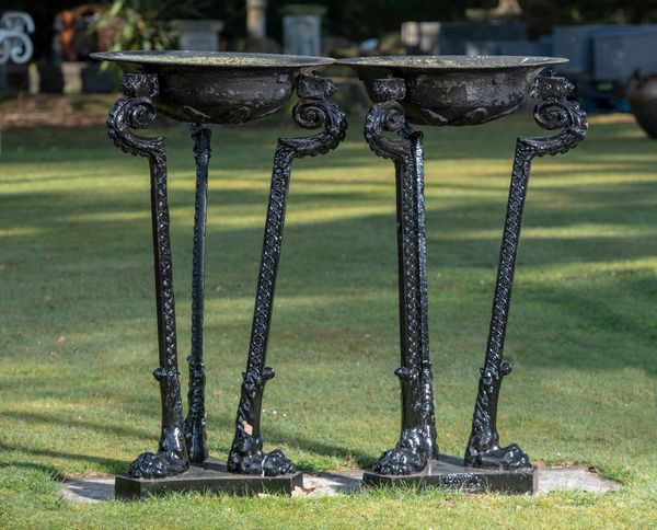 A pair of cast iron braziers mid 19th century one with makers stamp Addis. Leicester Street and with diamond registration mark 132cm high...