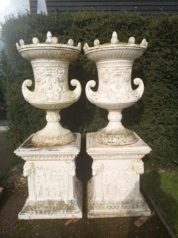 A pair of impressive and unusual cast iron lidded finials on pedestals early 20th century 210cm high
