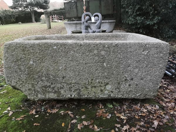 A large rectangular Cornish granite trough 70cm high by 175cm wide by 108cm deep