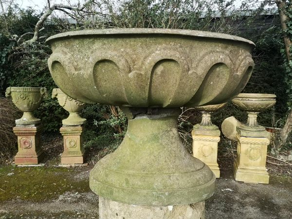 A rare Kilkenny marble cistern of oval form on stand 18th/19th century on associated square plinth 69cm high by 76cm wide From a Private Collection...