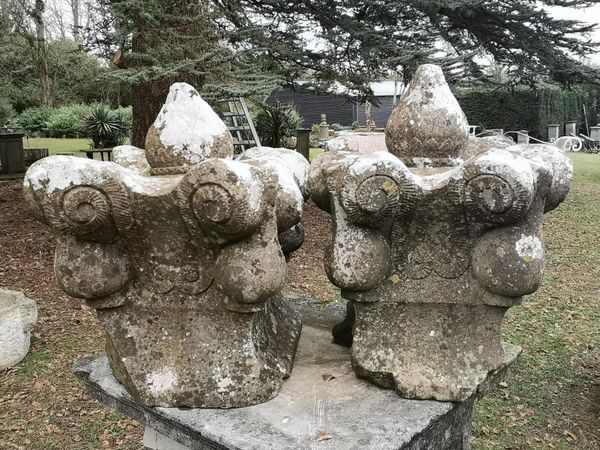 A pair of carved Kilkenny marble gate pier tops 18th/19th century 64cm high From a Private Collection in Ireland, see lot 35 for further...