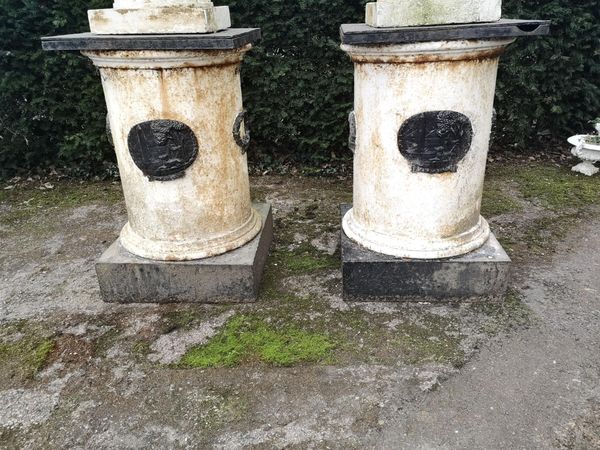 A pair of rare cast iron pedestals Irish, 19th century with applied plaques inscribed with Gaelic 100cm high  From a Private Collection in Ireland,...