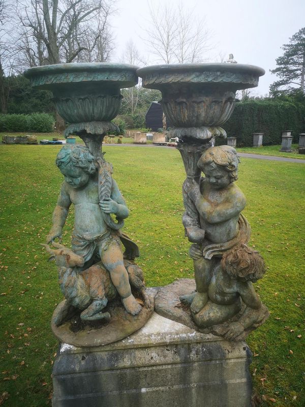 A pair of bronze figural planters late 20th century 102cm high From a Private Collection in Ireland, see lot 35 for further information