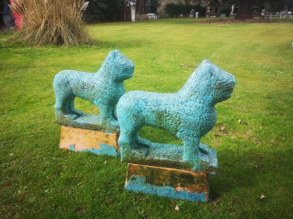 Gerald Moore A pair of composition stone Egyptian style cats with blue finish 55cm high Part of the Late Dr Gerald Moore Collection of Paintings and...